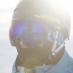 A rider wearing an Out Of Earth ski goggle under his wipeout helmet