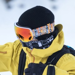 An Out Of rider wearing an open ski goggle during a freeride session